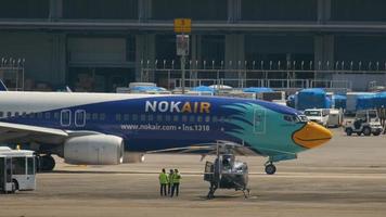 PHUKET, THAILAND NOVEMBER 28, 2016 - NOK Air Boeing 737 HS DBP taxiing before departure from Phuket airport video