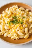 macaroni creamy corn cheese on plate photo