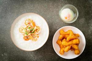 Congee with shrimps and fresh ginger photo