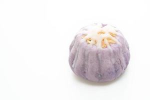 taro bun with white sugar cream and nut on white background photo