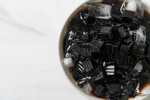 Black grass jelly with ice photo