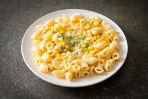 macaroni creamy corn cheese on plate photo