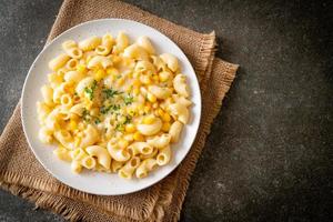 macaroni creamy corn cheese on plate photo