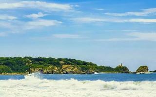 Extremely huge big surfer waves at beach Puerto Escondido Mexico. photo