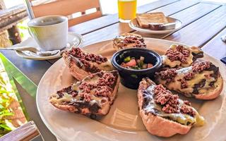 Mexican breakfast bread roll with chorizos in Oaxaca Mexico. photo