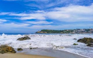 Extremely huge big surfer waves at beach Puerto Escondido Mexico. photo