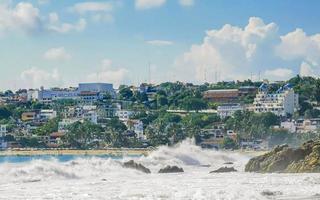 Extremely huge big surfer waves at beach Puerto Escondido Mexico. photo