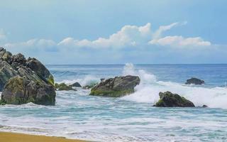 Extremely huge big surfer waves at beach Puerto Escondido Mexico. photo