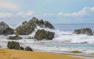 Extremely huge big surfer waves at beach Puerto Escondido Mexico. photo