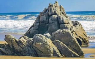 Extremely huge big surfer waves at beach Puerto Escondido Mexico. photo