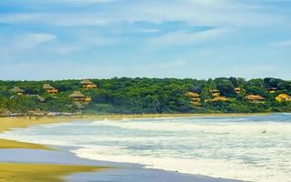 Beach with beautiful huge big surfer waves Puerto Escondido Mexico. photo