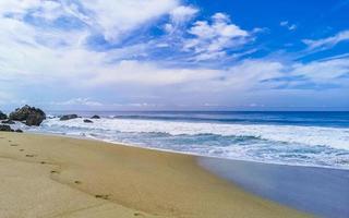 Extremely huge big surfer waves at beach Puerto Escondido Mexico. photo