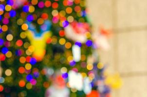 Blurred focus of colorful Christmas tree for Holiday decoration background. photo