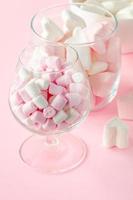 marshmallow heart shape and mini with love concept on pink background photo