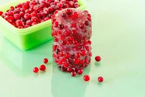 Frozen cranberries. Frozen organic berries for desserts and bakery photo