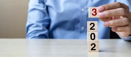 block 2023 text on table. Resolution, strategy, plan, goal, motivation, reboot, business and New Year holiday concepts photo