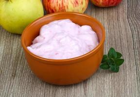 Strawberry yoghurt on wood photo