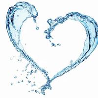 Heart shaped splash of water. photo