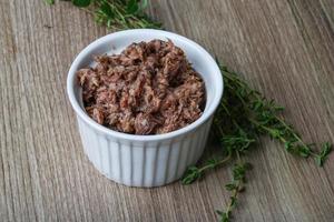 Canned tuna dish view photo