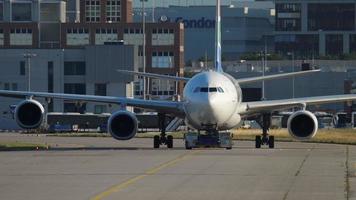 FRANKFURT AM MAIN, GERMANY JULY 21, 2017 - South African Airways Airbus 340 ZS SNG towing by tractor to service. Fraport, Frankfurt, Germany video