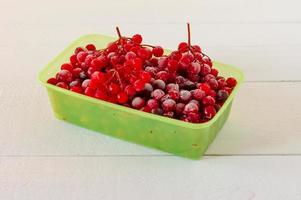 Frozen cranberries. Frozen organic berries for desserts and bakery photo