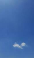 Bright blue sky and a few thin clouds adorn 01 photo