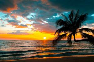 Silhouette of palm trees Beautiful sunset on the tropical sea beach background for travel in holiday relax time, photo