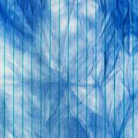 handcrafted Shibori blue abstract pattern on silk photo