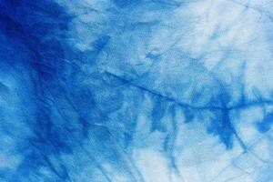 handcrafted tie dye blue abstract pattern on silk photo