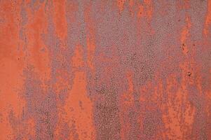 Red Rusty textured metal background. Copy space for designers. photo