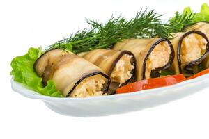 Egg-plant roll in a bowl on white background photo