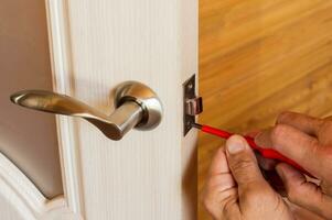 Assembly of lock with handles and latch for an interior door. photo