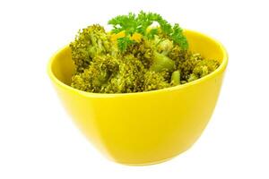 Boiled cauliflower in a bowl on white background photo