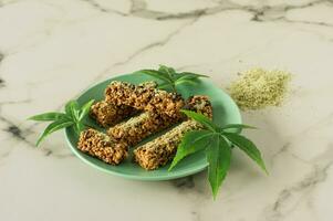 Homemade Chocolate protein bars with hemp seeds and dates. Healthy vegan food. photo