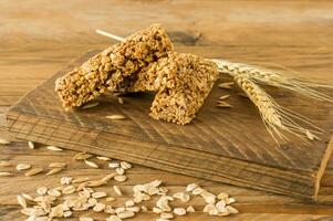 Raw Organic Granola Bars with Seeds and Nuts. Homemade sweet healthy dessert for breakfast photo