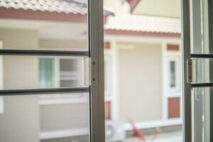 mosquito net wire screen on house window protection against insect photo