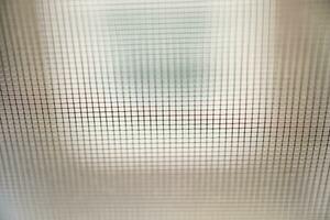 mosquito net wire screen on house window protection against insect photo