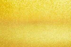 Abstract gold glitter sparkle with bokeh light background photo