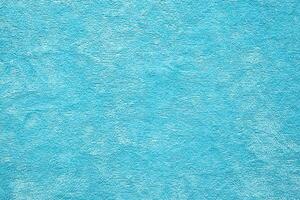 Blue towel fabric texture surface close up background photo