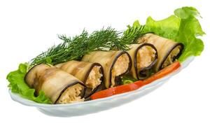 Egg-plant roll in a bowl on white background photo