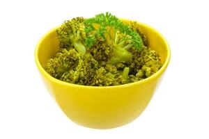 Boiled cauliflower in a bowl on white background photo