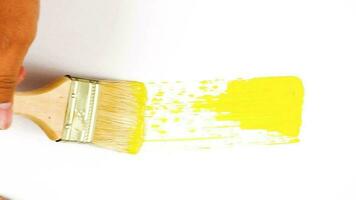 abstract trendy hand paint brush stroke of yellow color. artistic painting for overlay transitions and ornate footage. video