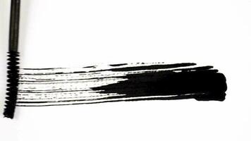 black line brush strokes for footage elements overlay. animated hand scraping mascara with black ink for lower third and transition. video