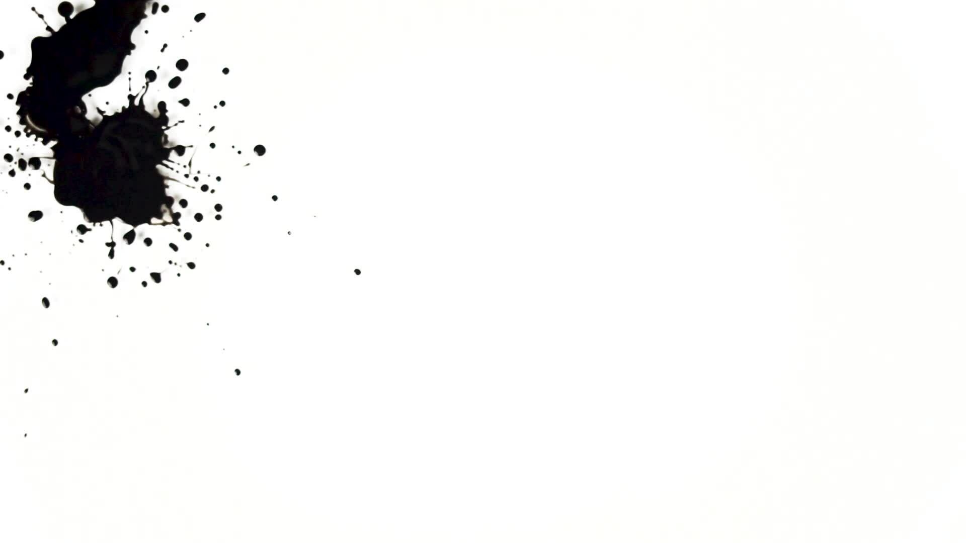 Drop black paint animation on the isolated white background. Abstract