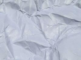 Top view of white crumpled paper texture background. Copy space for design and artwork photo