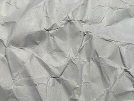 Top view of white crumpled paper texture background. Copy space for design and artwork photo