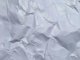 Top view of white crumpled paper texture background. Copy space for design and artwork photo