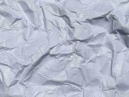 Top view of white crumpled paper texture background. Copy space for design and artwork photo