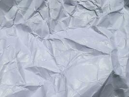 Top view of white crumpled paper texture background. Copy space for design and artwork photo