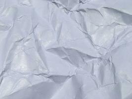 Top view of white crumpled paper texture background. Copy space for design and artwork photo